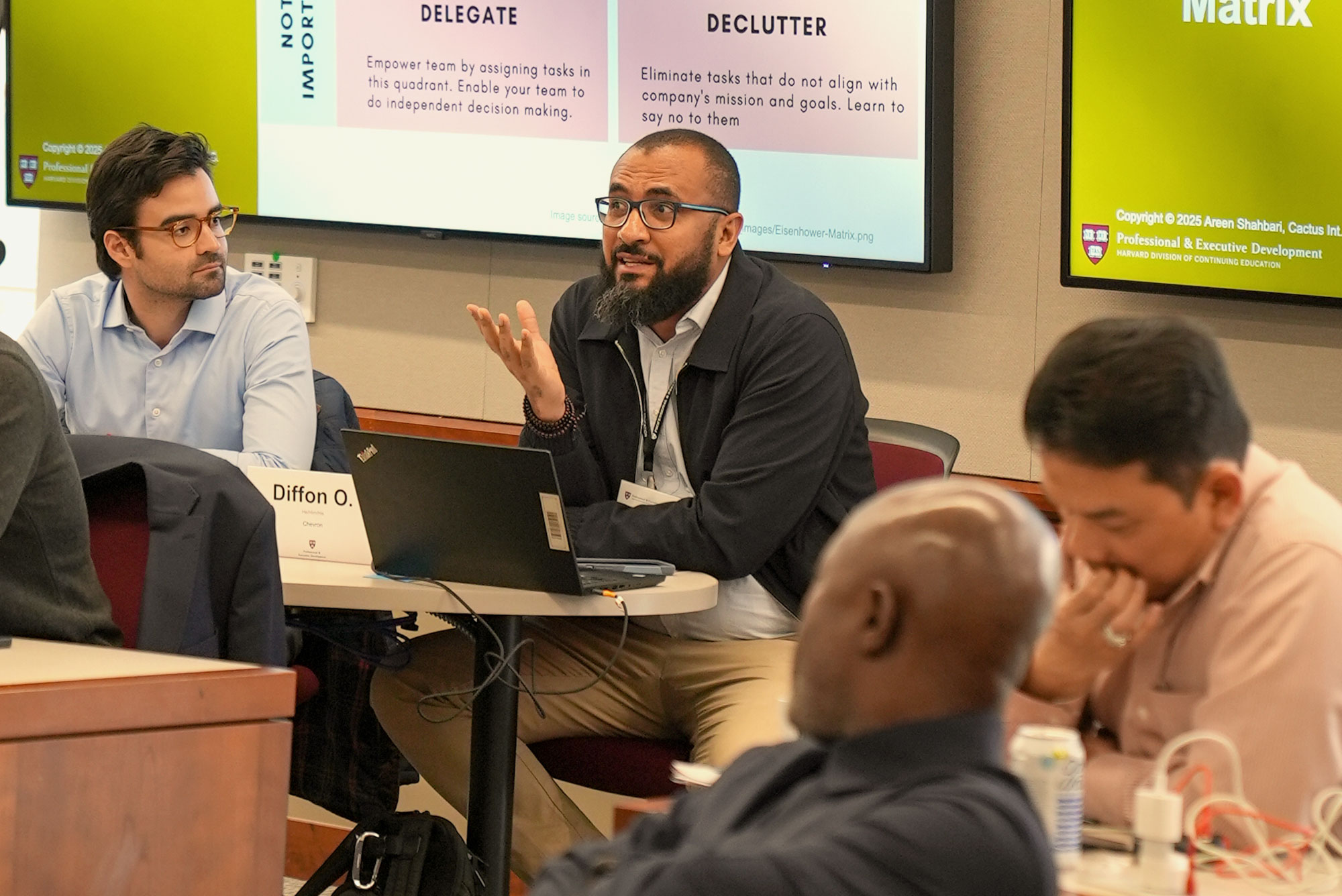 A student at Harvard DCE Professional & Executive Development speaks during class.